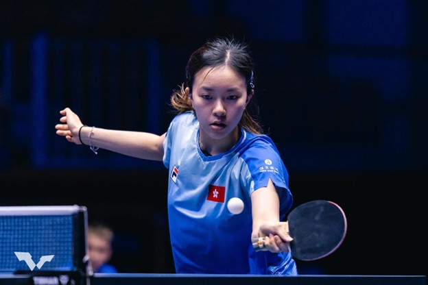 A person playing ping pongDescription automatically generated